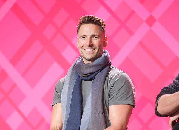 120625_MT_ReindeerGames_064_HSLSite_crop Andrew Walker standing in front of pink background